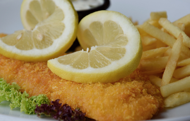 Image of fried breaded fish fillet with tartar dip from Clay restaurant's platters menu