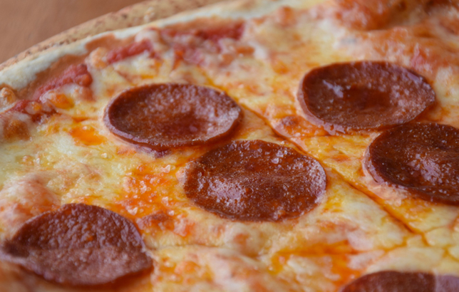 Image of Italian pizza with pepperoni slivers.