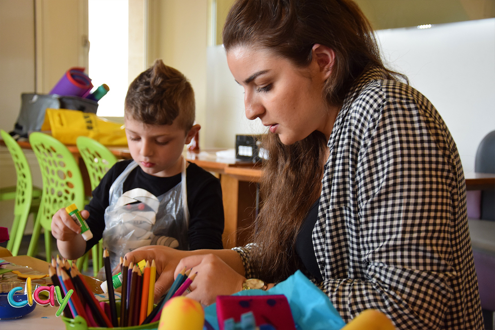 Image of parent and child playing competitive family games