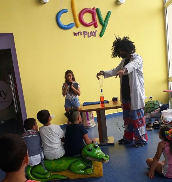 Image of a mad science show at Clay restaurant and playground